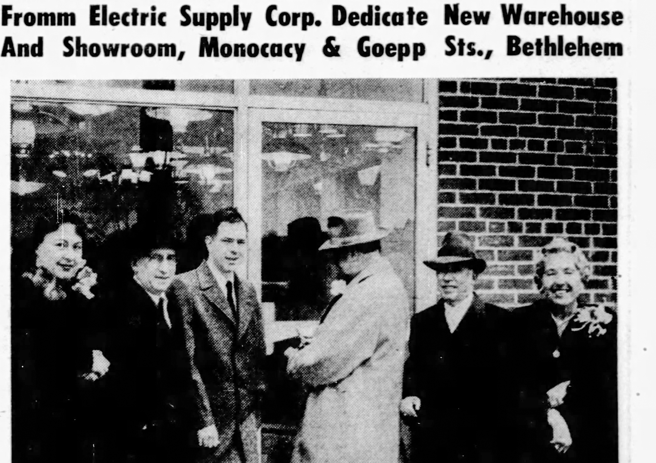 Bethlehem Mayor Earl Schaeffer cuts the ribbon at the opening ceremony. (L-R) Sally Fromm; Vice President Louis Fromm; Branch Manager Carl Brown; Schaeffer; President Alexander Fromm; and Helen Fromm.